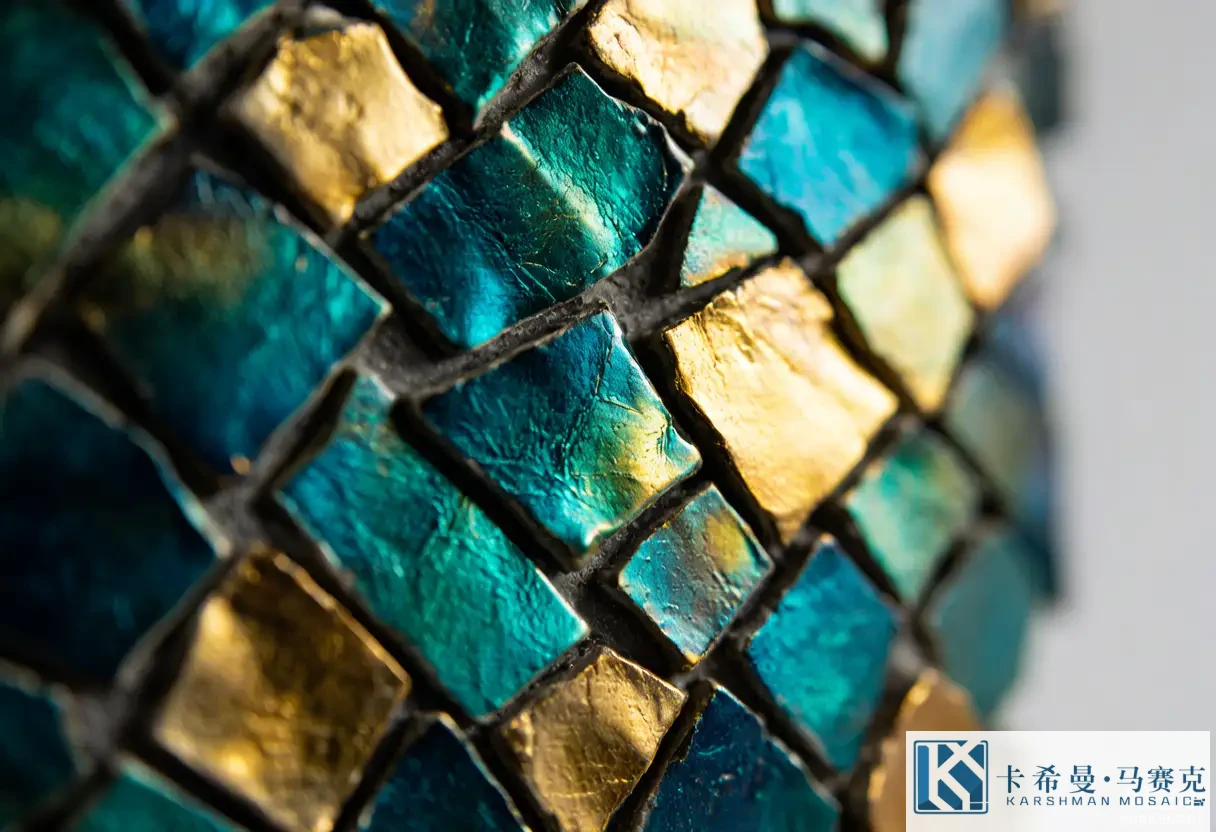 Extreme close up of iridescent mosaic wall tiles in teal and gold tones