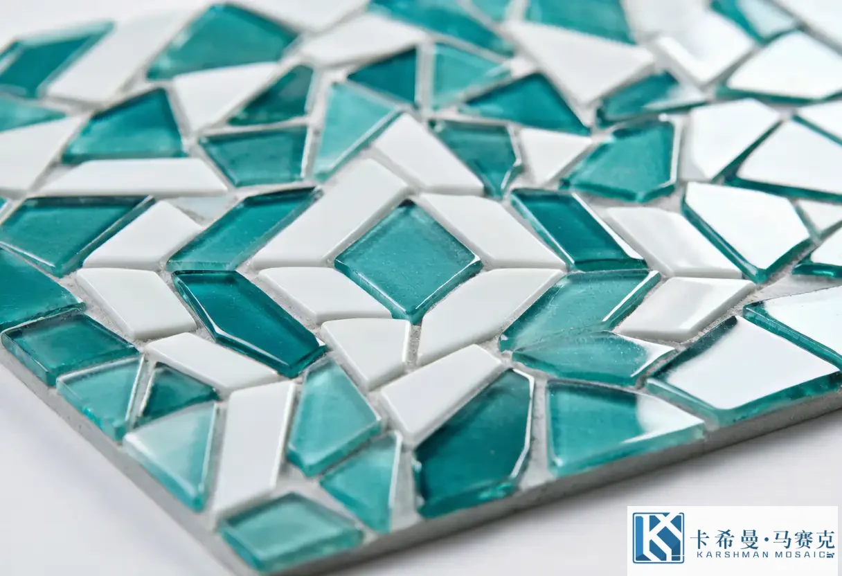Macro close up of aqua and white glass mosaic tiles forming a geometric kitchen backsplash pattern