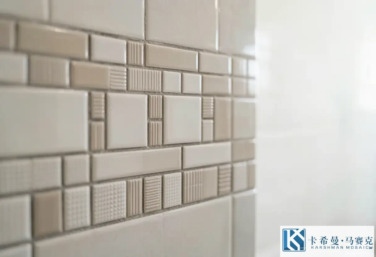 Macro of a ceramic mosaic tiled bathroom shower wall in soft beige and white