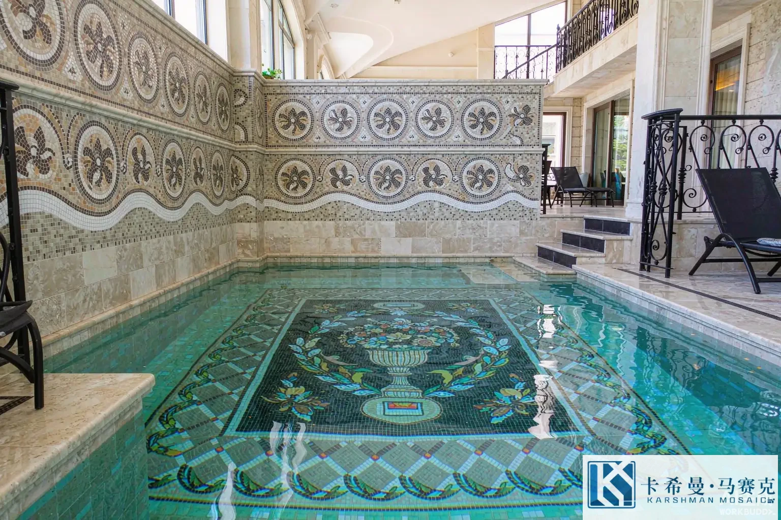 Swimming pool interior of a European villa with a custom classical glass mosaic mural of a laurel border and an urn motif on the floor